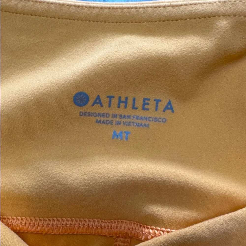Athleta Golden Activewear Stash Pocket salutation tight with powervita fabric - Picture 2 of 4